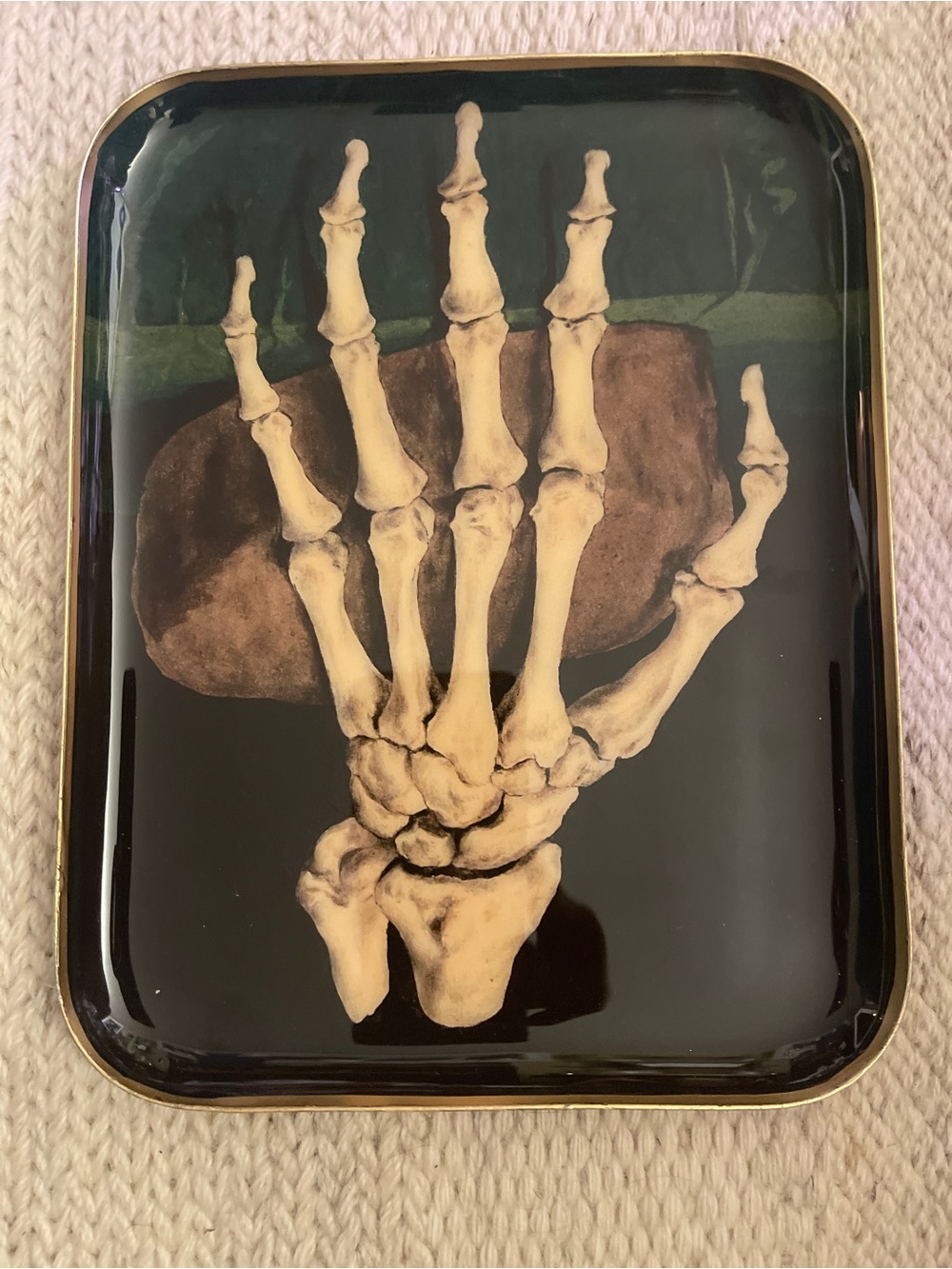 Skeleton Hand Tray by Terrain for Anthropologie.